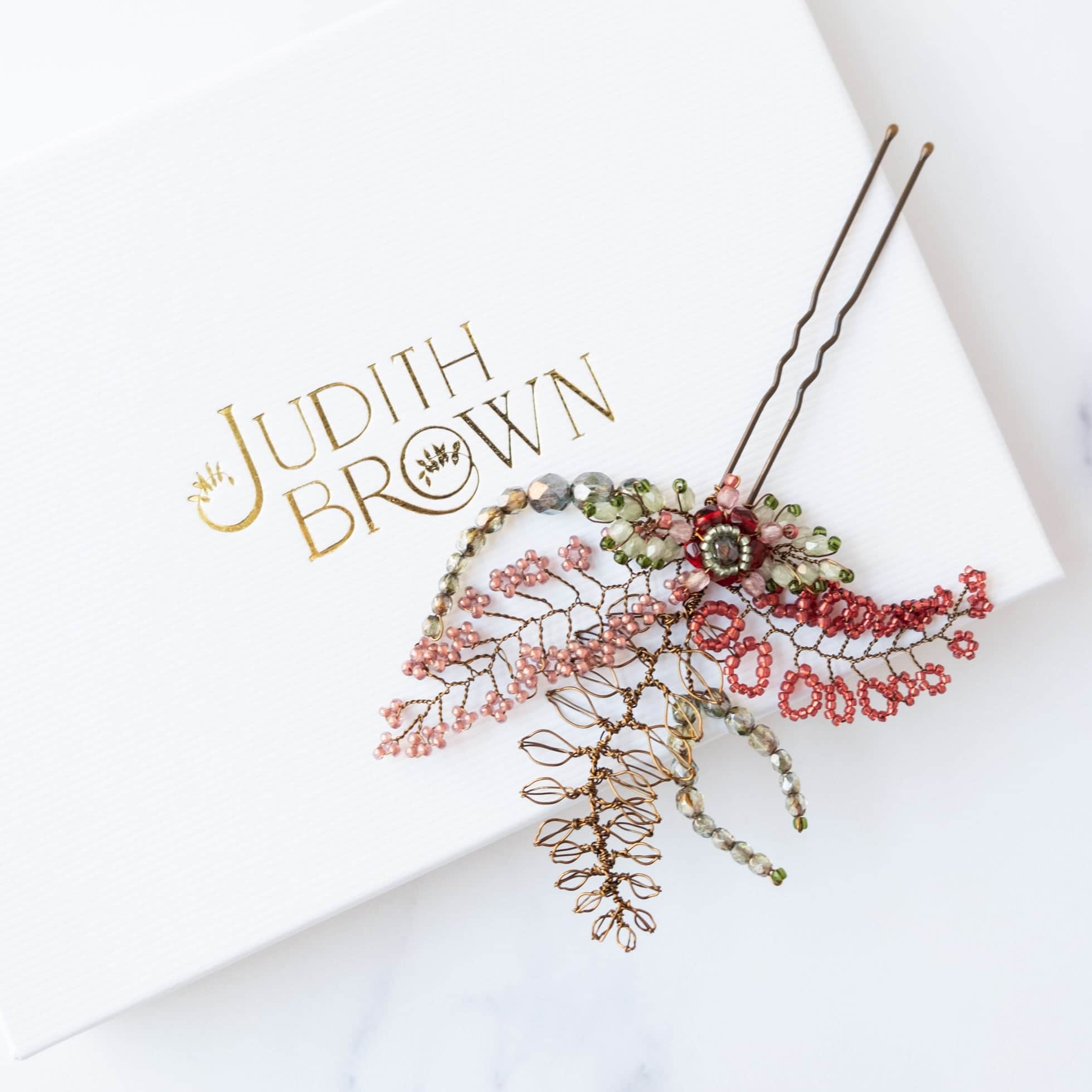 Fiorenza hair pin in reds and greens - Judith Brown Bridal