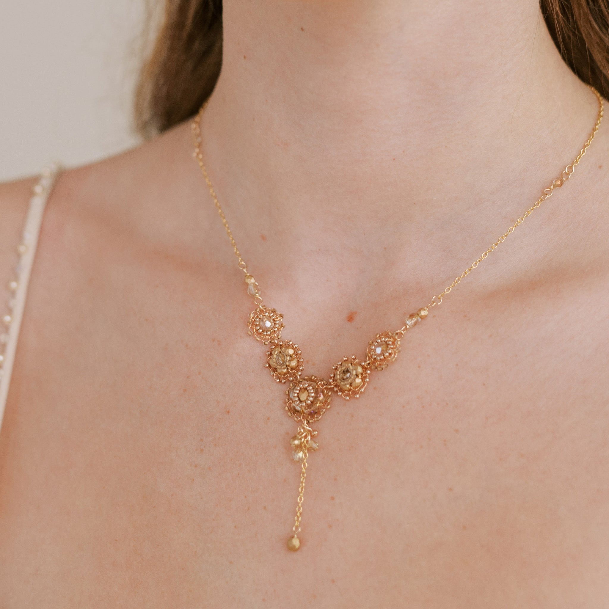 Fiori necklace in gold plated wire with glass beads by Judith Brown Bridal