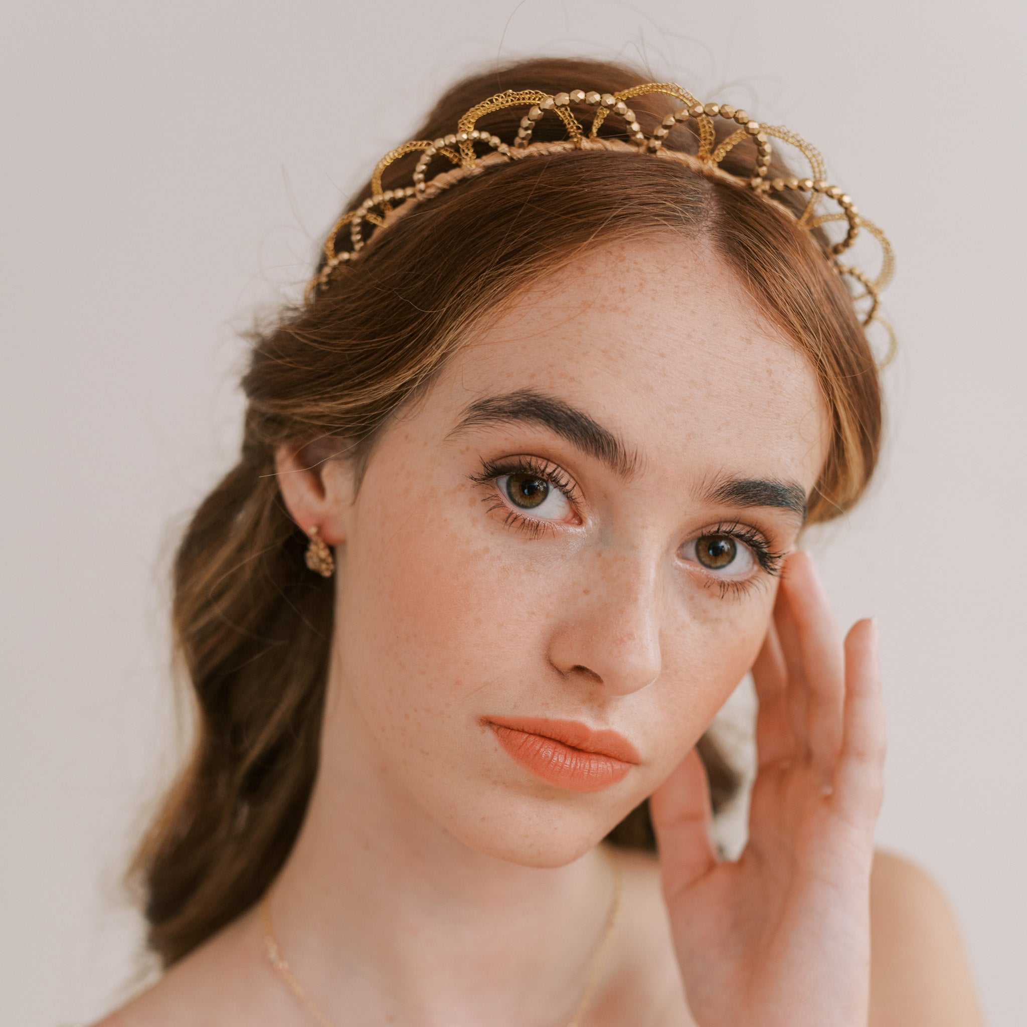 Handmade bridal crown in gold by Judith Brown Bridal