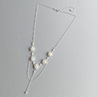 Handmade wedding necklace in silver with mother of pearl by Judith Brown Bridal