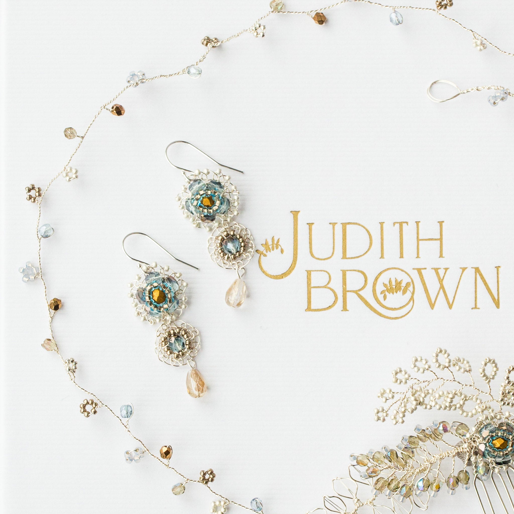 Handmade bridal earrings in silver and blue by Judith Brown Bridal
