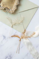 Eva hair pin in gold or silver wire by Judith Brown Bridal
