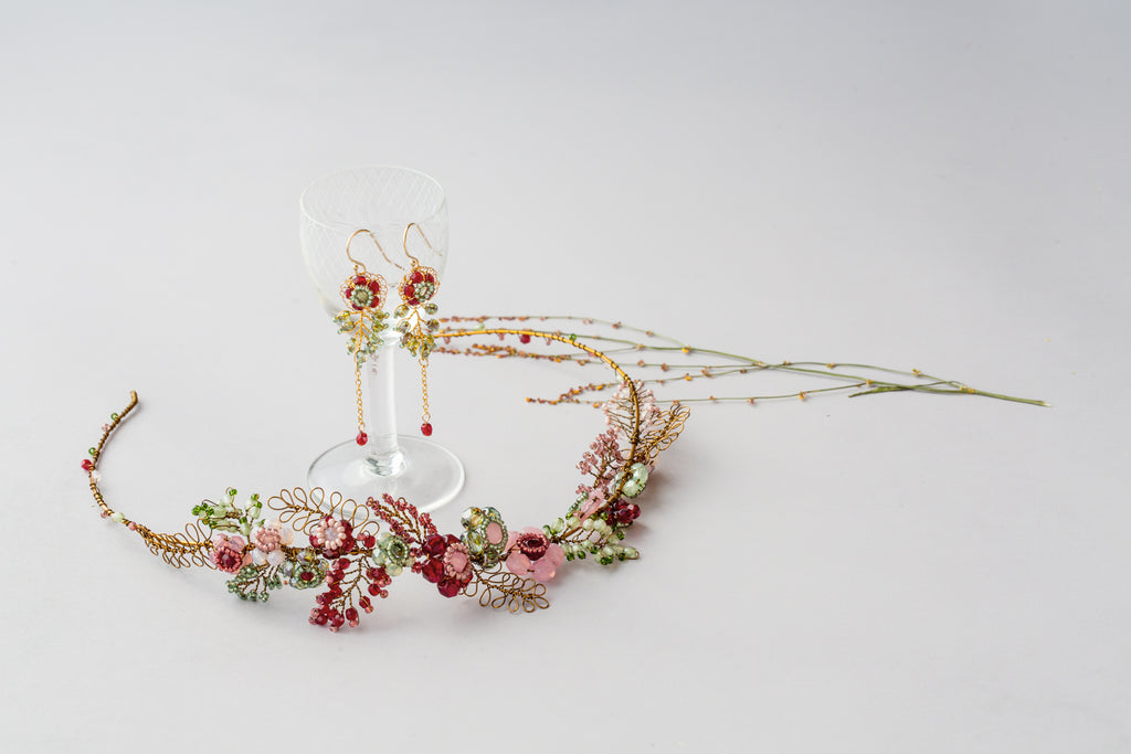 handmade bridal headpiece in reds and greens with matching bridal earrings