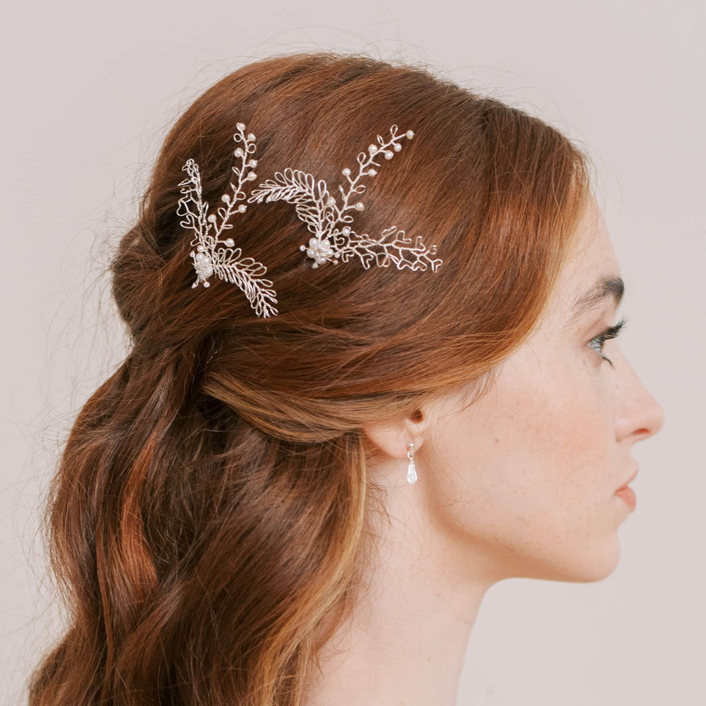 pair of wedding hair pins in silver with pearls by Judith brown Bridal