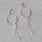 Silver drop earrings with freshwater pearls and glass beads by Judith Brown Bridal