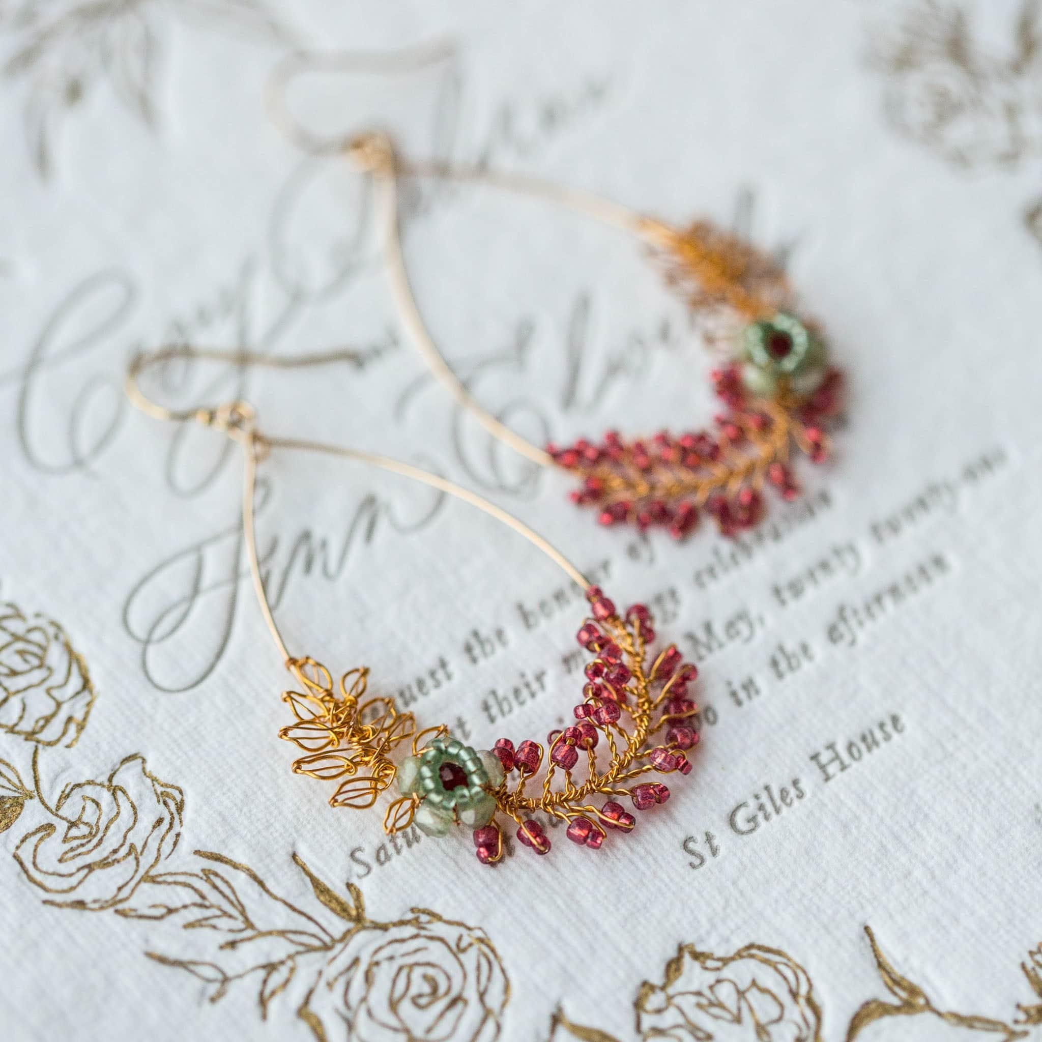 Cora wedding earrings in gold wire with handmade wire leaves and hand beaded by Judith Brown Bridal