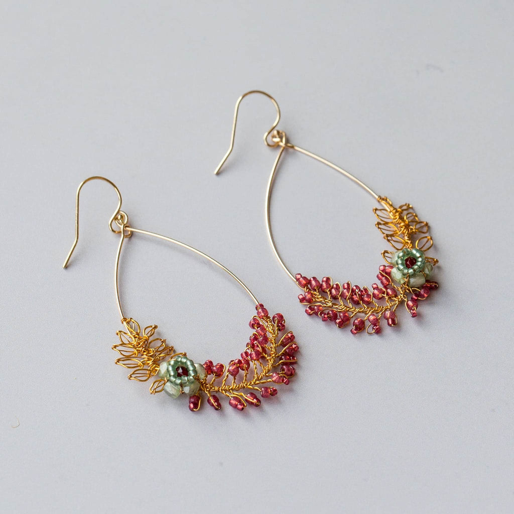 Handmade wedding earrings by Judith Brown Bridal with handmade wire leaves and beaded flowers by Judith Brown Bridal