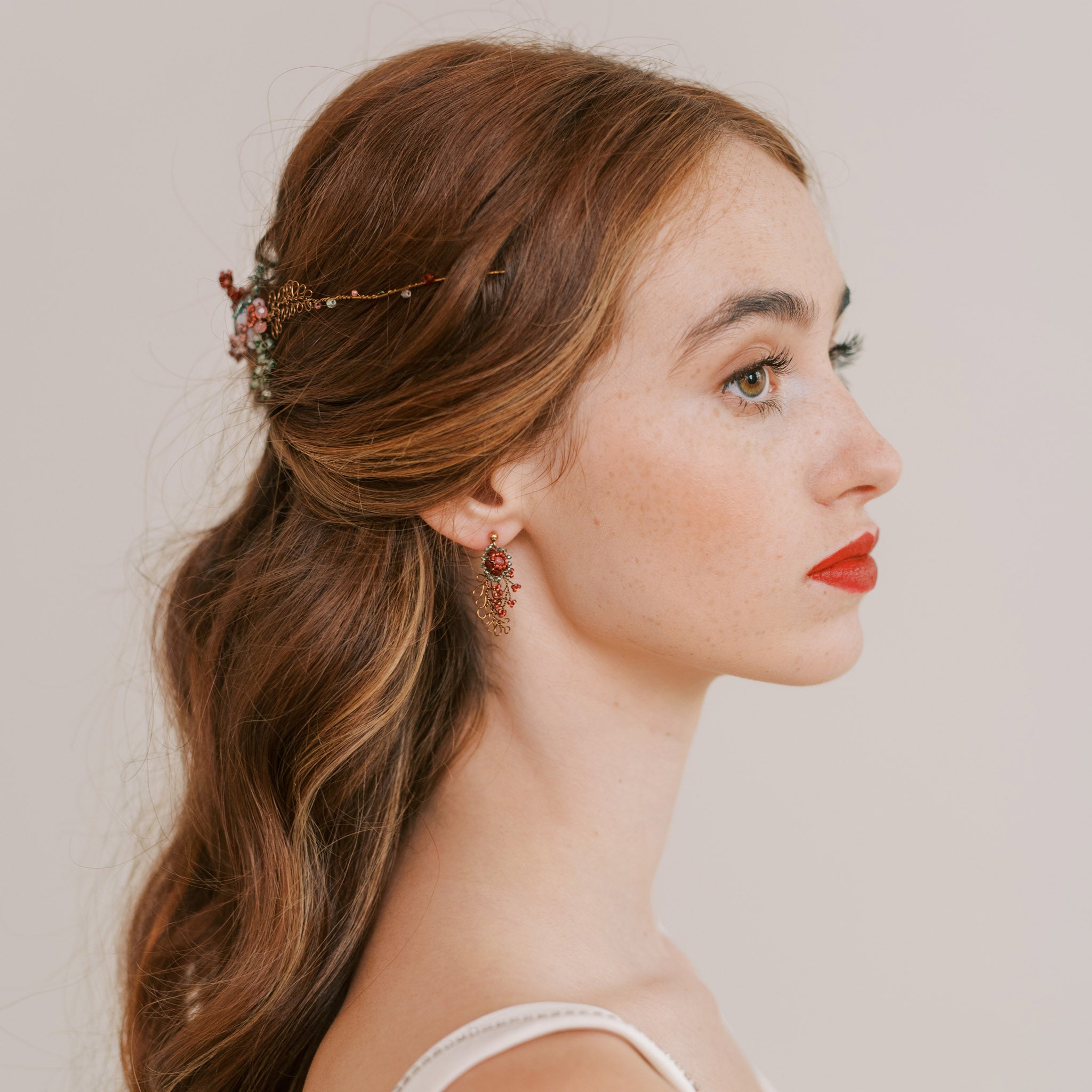 Edera earrings with beaded flower and wire leaves by Judith Brown Bridal