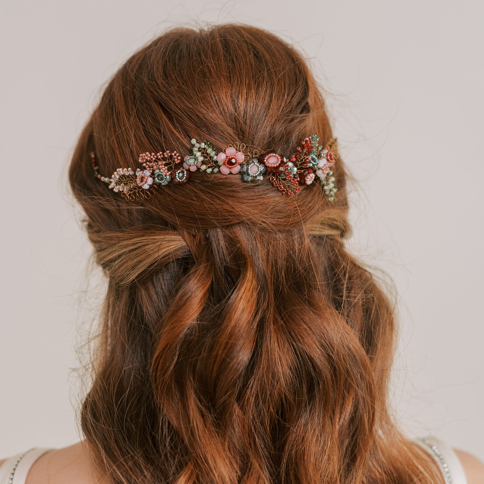 handmade nature inspired wedding hairvine in pink, red and green by Judith Brown Bridal