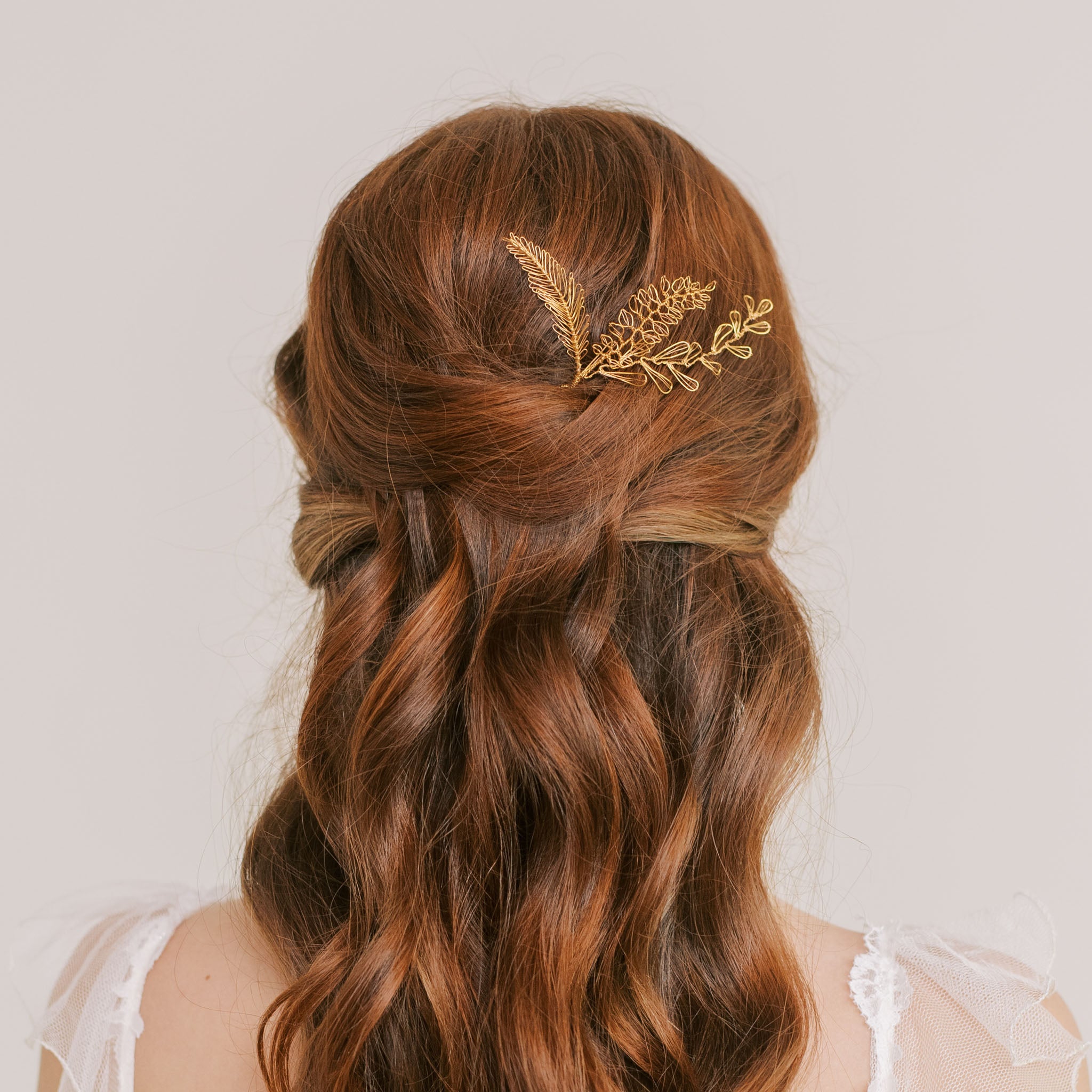 Gold leaf wedding hair pin by Judith Brown Bridal