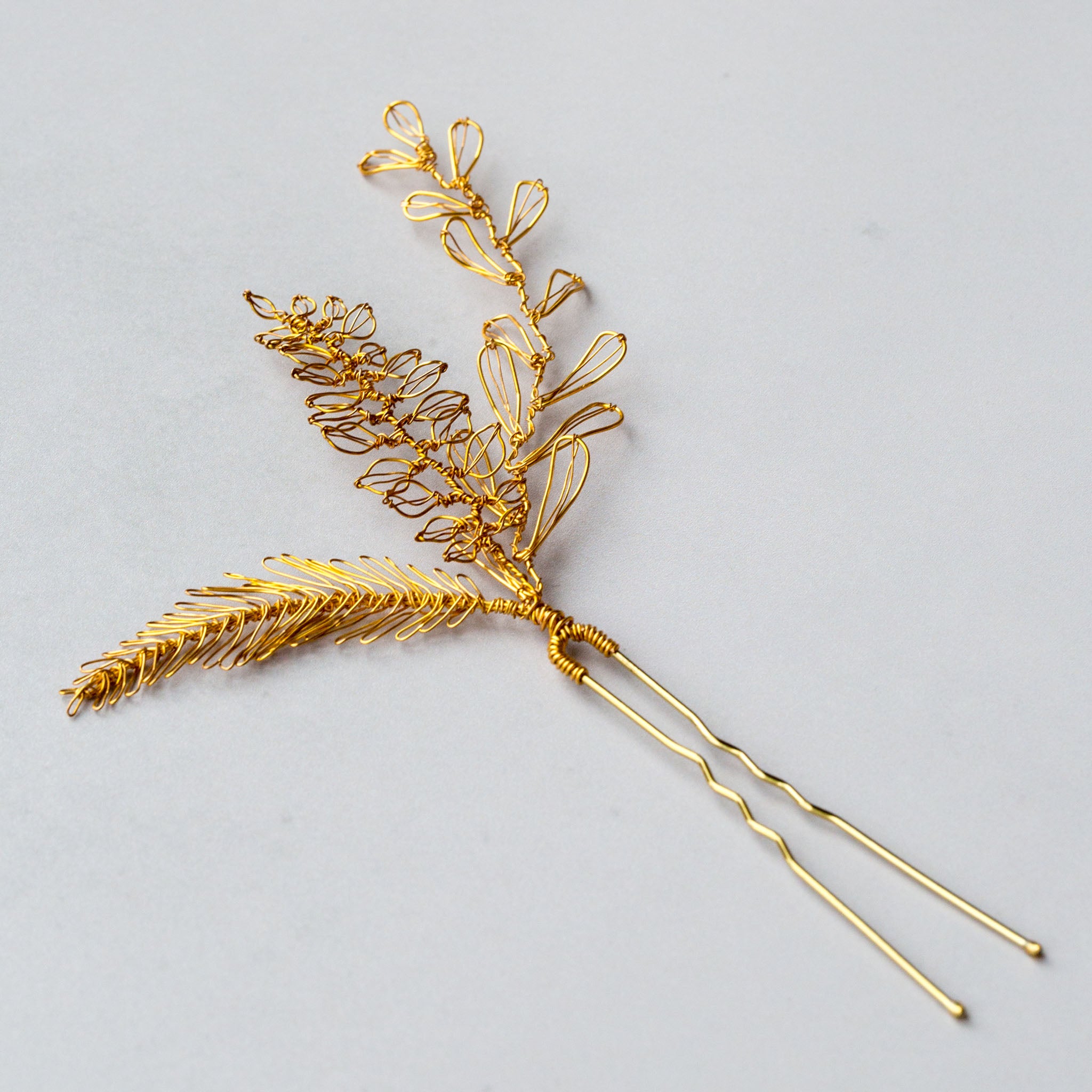Gold nature inspired hair pin by Judith Brown Bridal