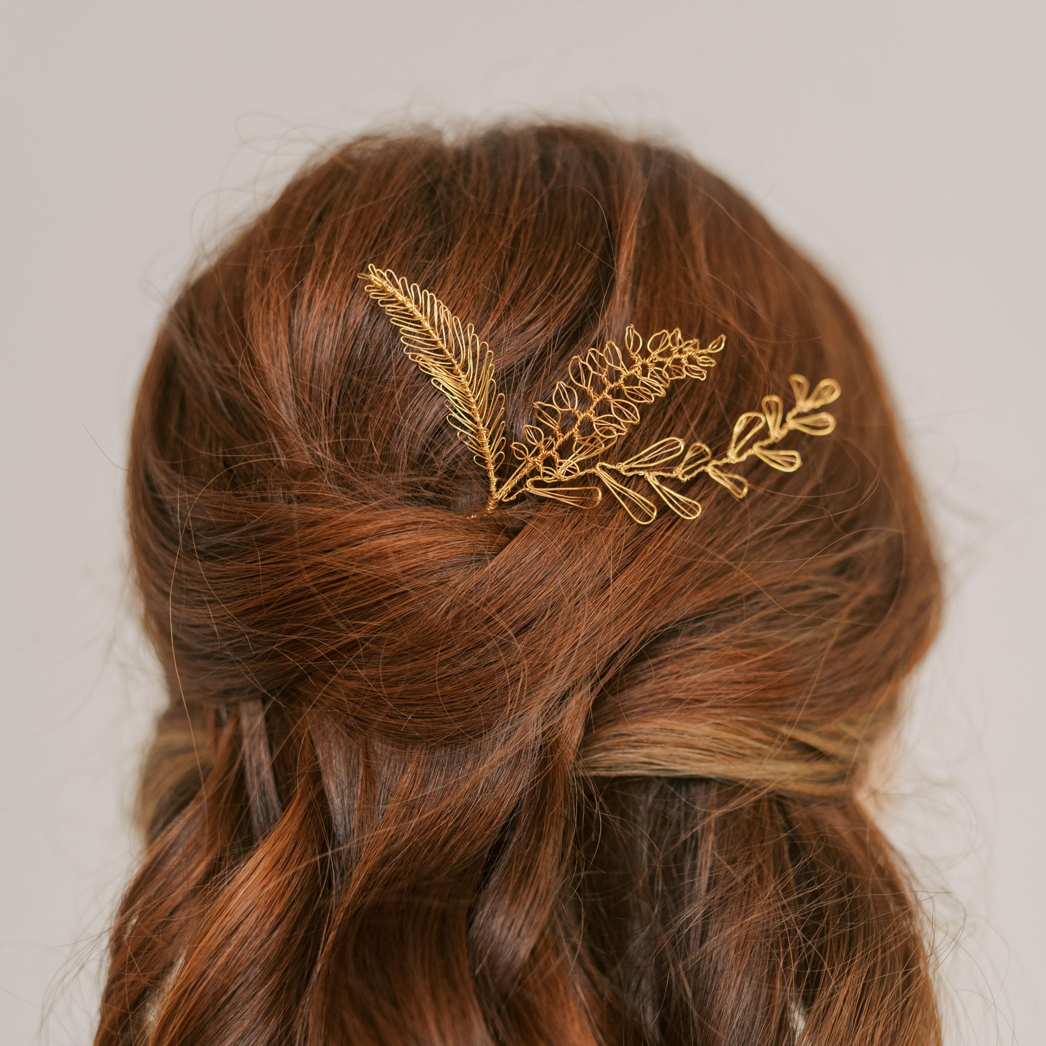 Eva leaf hair pin in gold by Judith Brown Bridal