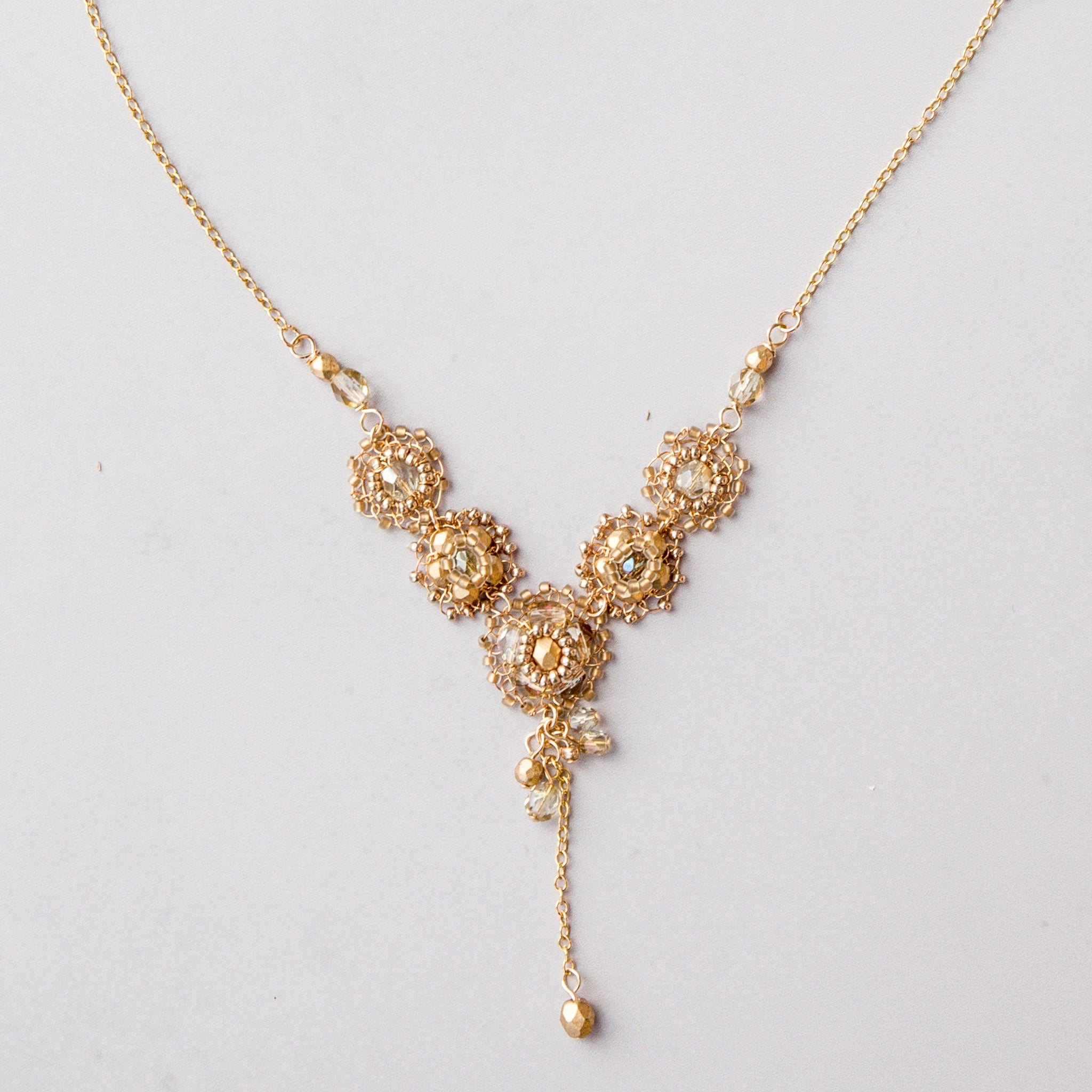 Delicate beaded and handstitched wire wedding necklace by Judith Brown Bridal