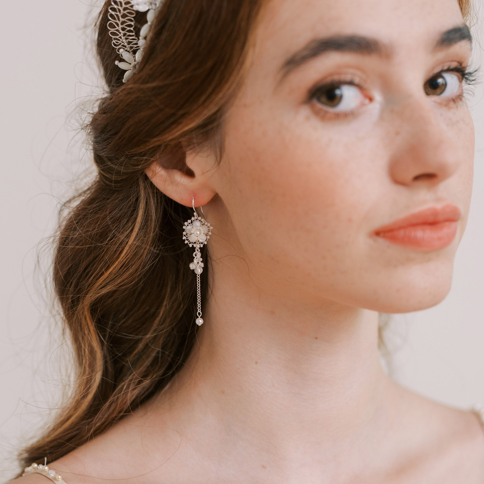 Mother of pearl and silver drop wedding earrings by Judith Brown Bridal