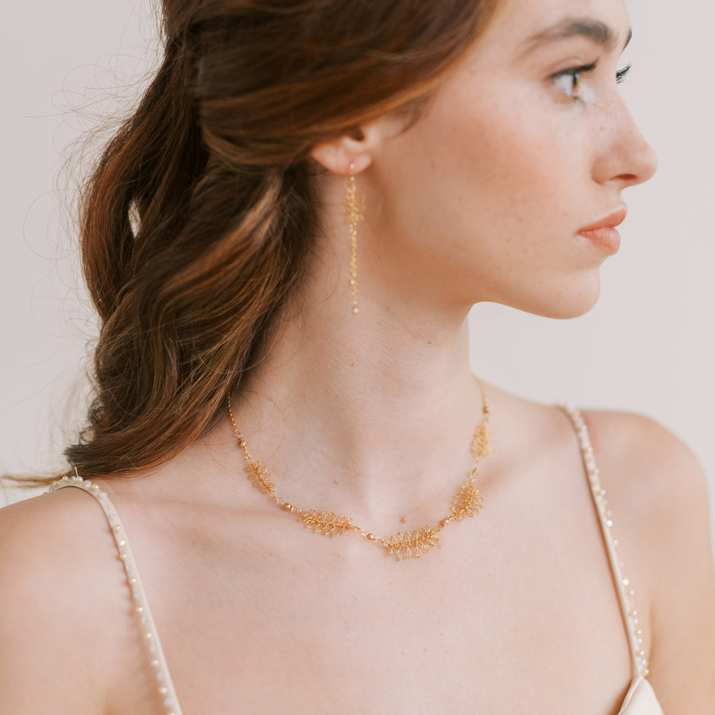 Delicate wedding necklace with handmade leaves in gold by Judith Brown Bridal