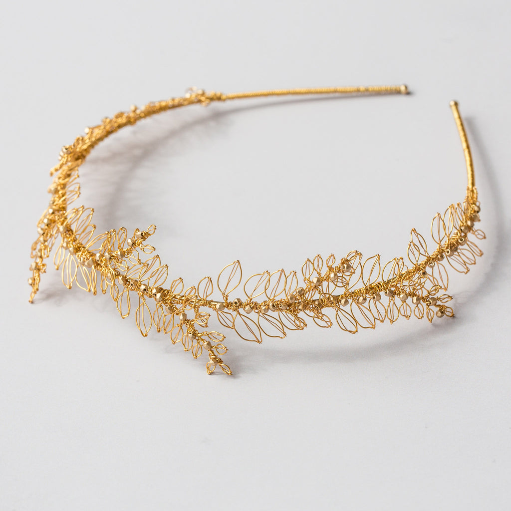 Ornella gold wire wedding headpiece with handmade leaves by Judith Brown