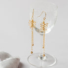 Intricate handmade leaf earrings with drop for weddings by Judith Brown Bridal