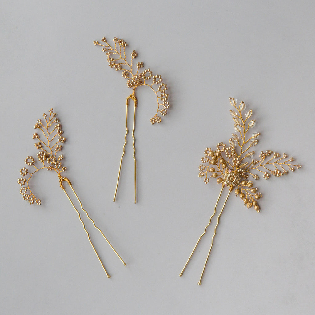 Set of three wedding hair pins in gold by Judith Brown Bridal